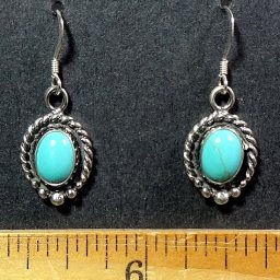 Turquoise cabochons mounted in a Sterling Silver setting