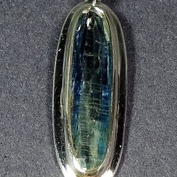 Kyanite pendant resting in a very nice sterling Silver setting