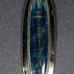 Kyanite pendant resting in a very nice sterling Silver setting