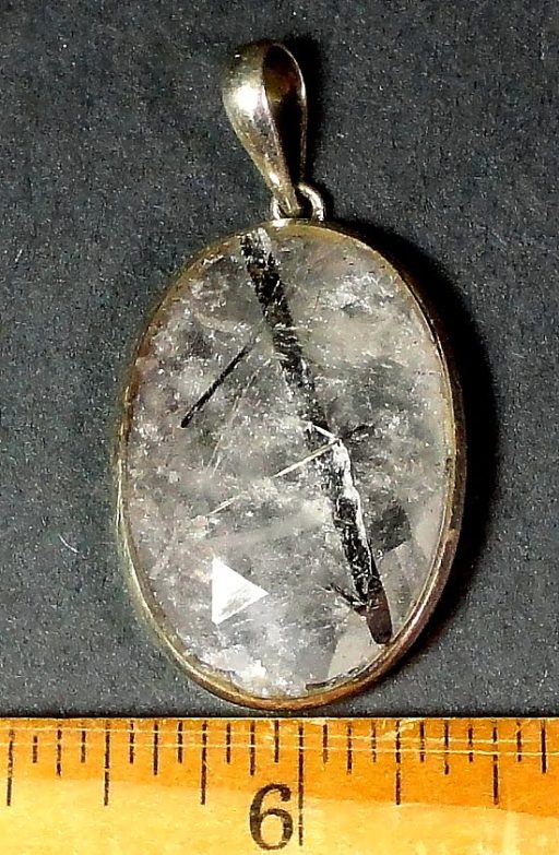 sterling Silver pendant with a 21mm x 31mm faceted Tourmalated Quartz cabochon